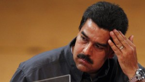 Venezuela's acting President Nicolas Maduro attends a ceremony at the Teresa Carreno theater in Caracas March 13, 2013. Venezuelan acting President Nicolas Maduro said on Wednesday that "far right" figures in the United States were plotting to kill opposition leader Henrique Capriles. REUTERS/Carlos Garcia Rawlins (VENEZUELA - Tags: POLITICS ELECTIONS)