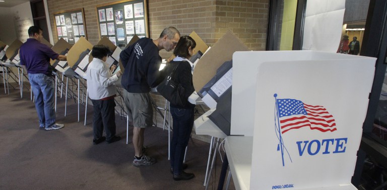 FILE - This Oct. 30, 2012 file photo shows people voting early at the Salt Lake County Government Building in Salt Lake City, ahead of the Nov. 6 election. Theres always grousing about people who dont bother to vote. But look at it another way: An estimated 133 million Americans will cast ballots in Tuesdays election. Thats about 6 in 10 eligible adults. Some will persevere despite long lines, pressing personal burdens or the devastation left by Superstorm Sandy. Why do they do it? Its not because any one voter will decide the contest between President Barack Obama and Mitt Romney. Depending on which state they live in, the odds of casting a deciding vote for president are somewhere between 1 in a million and essentially zero. (AP Photo/Rick Bowmer, File)